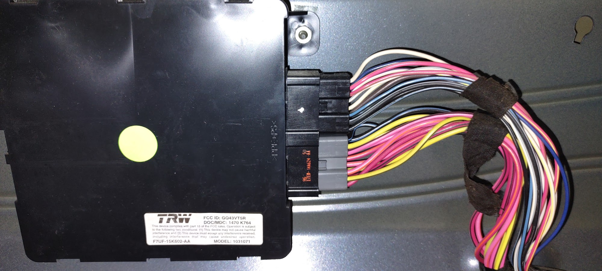Electronic module with bundled wires on a repair surface